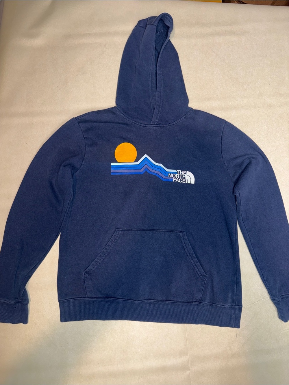 The North Face Navy Blue Hoodie with Sunset Graphic